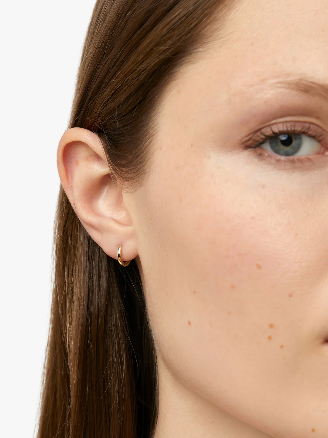 Gold Huggie Hoop Earrings - Image 3