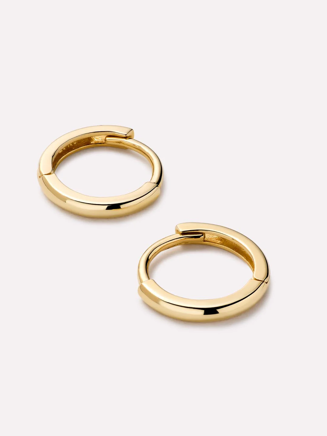 Gold Huggie Hoop Earrings - Image 4