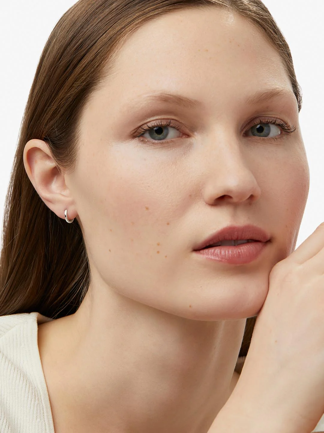 White Huggie Gold Hoop Earrings - Image 3